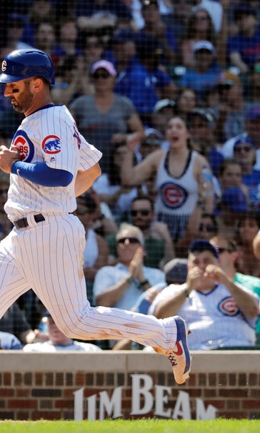 Kimbrel closes out debut with Rizzo's help, Cubs beat Braves